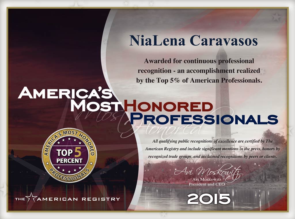 NiaLena Caravasos Receives America’s Most Honored Professionals Award | Law Office of NiaLena Caravasos NiaLena Caravasos holding America's Most Honored Professionals Award, symbolizing her exceptional achievements in the legal field